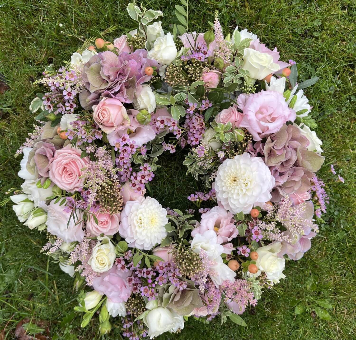 Soft, pastel pink and lilac floral wreath