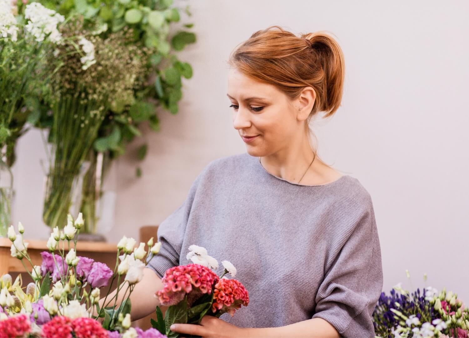 Founder of In Bloom, Jen, arranging flowers